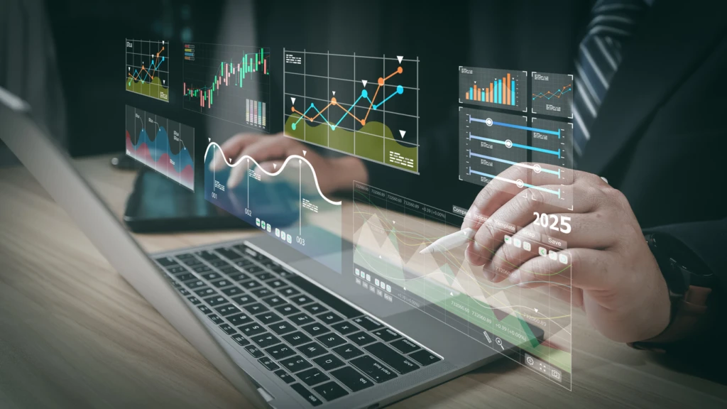 Análise de dados financeiras com gráficos e indicadores em um laptop, representando tendências de mercado e crescimento econômico 2025.