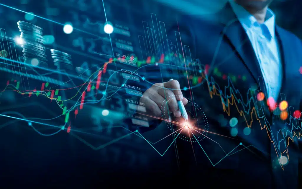 Homem de terno analisa gráficos financeiros digitais com gráficos de ações e dados em um ambiente tecnológico avançado, destacando inovação e tecnologia financeira.